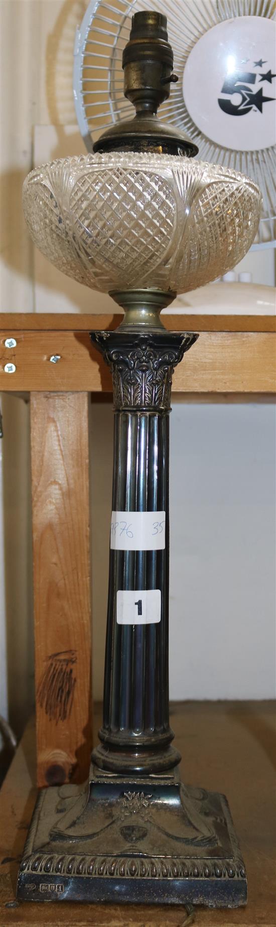 Silver table lamp with glass oil reservoir